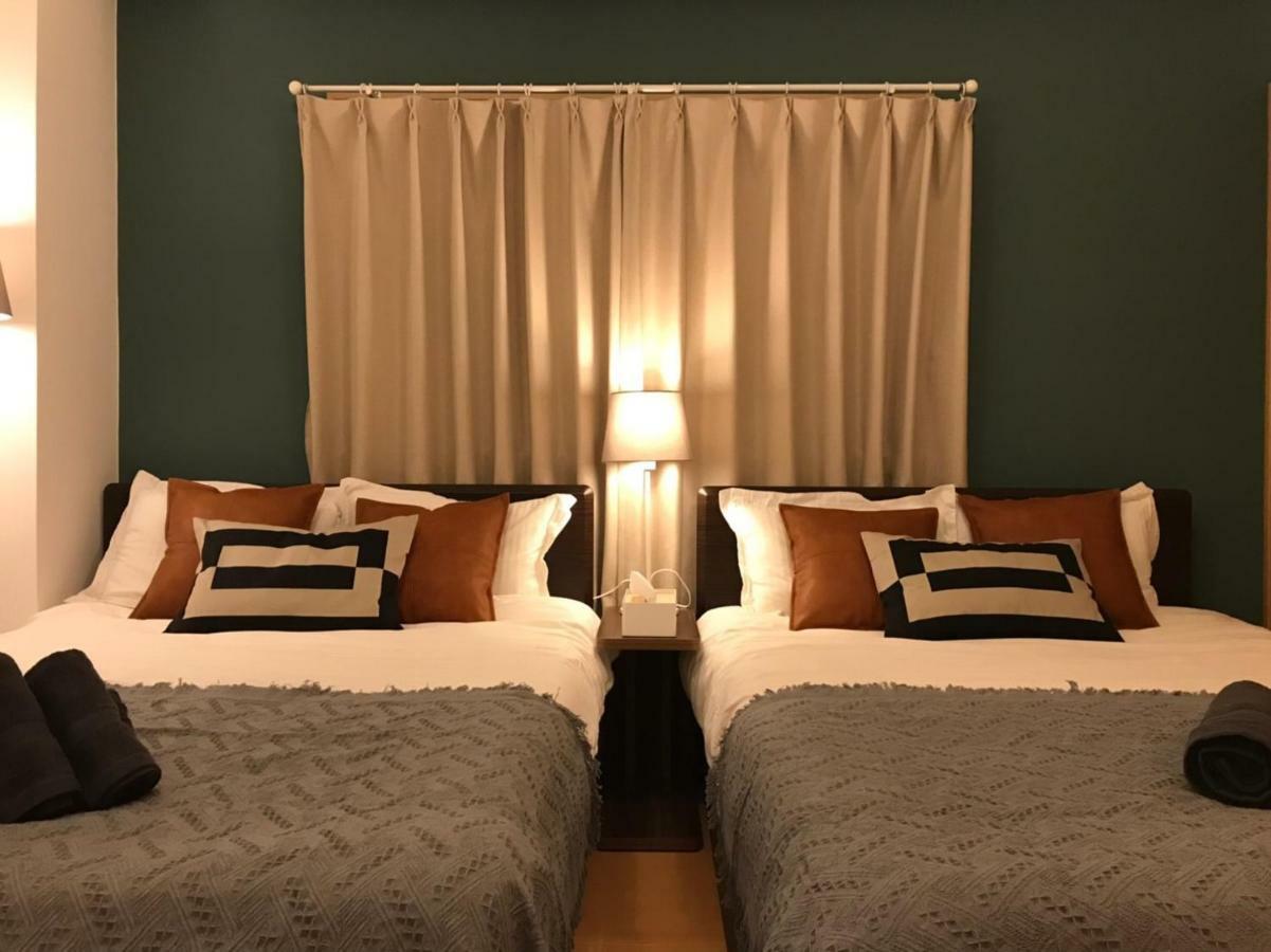Guest House Mii Osaka Esterno foto